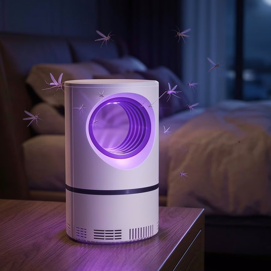 ZapiTrap lamp glowing on a bedside table in a dark bedroom