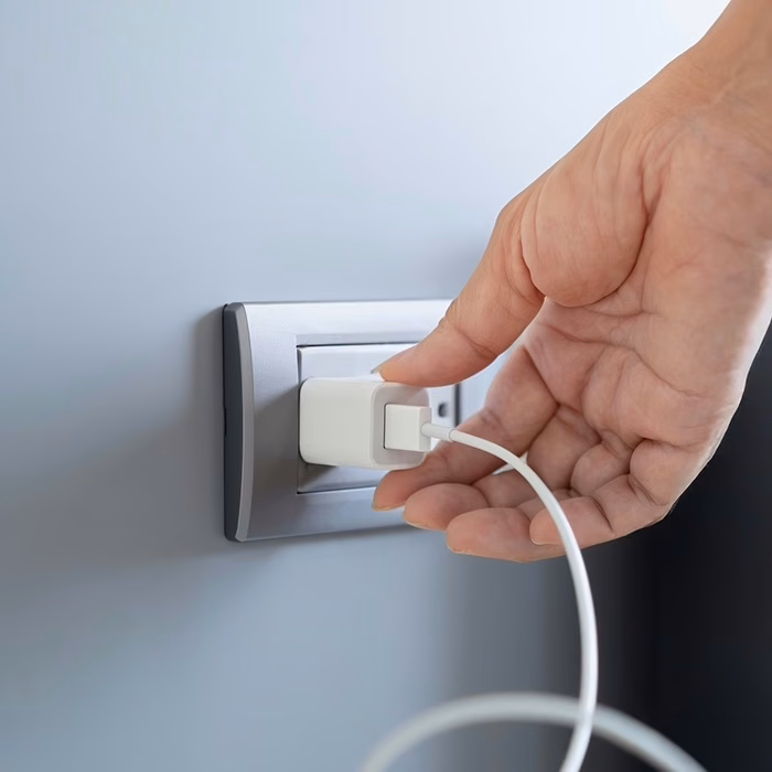USB cable from the lamp plugged into a wall adapter